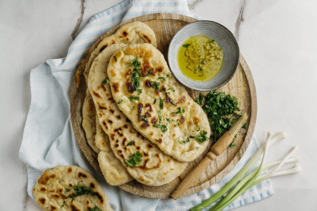pakistani-food-wooden-board-flat-lay-scaled-1-1024×683-1